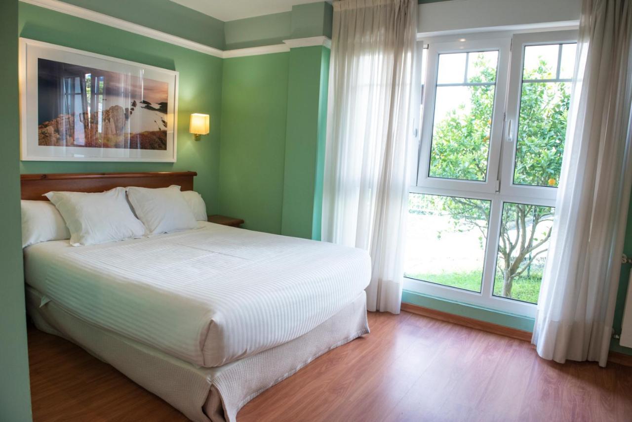 Hotel Faro De San Vicente ซาน บีเซนเต เด ลา บาร์เกรา ภายนอก รูปภาพ