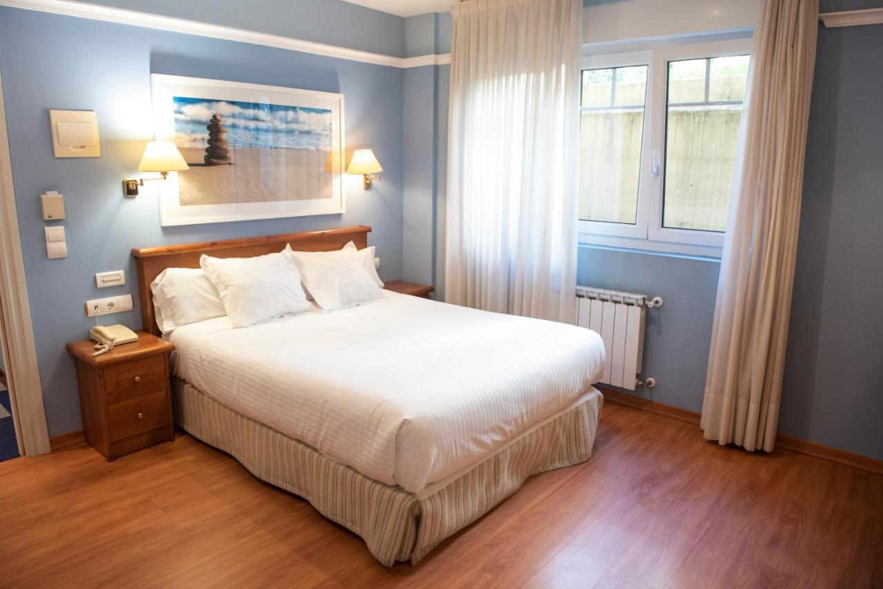 Hotel Faro De San Vicente ซาน บีเซนเต เด ลา บาร์เกรา ภายนอก รูปภาพ