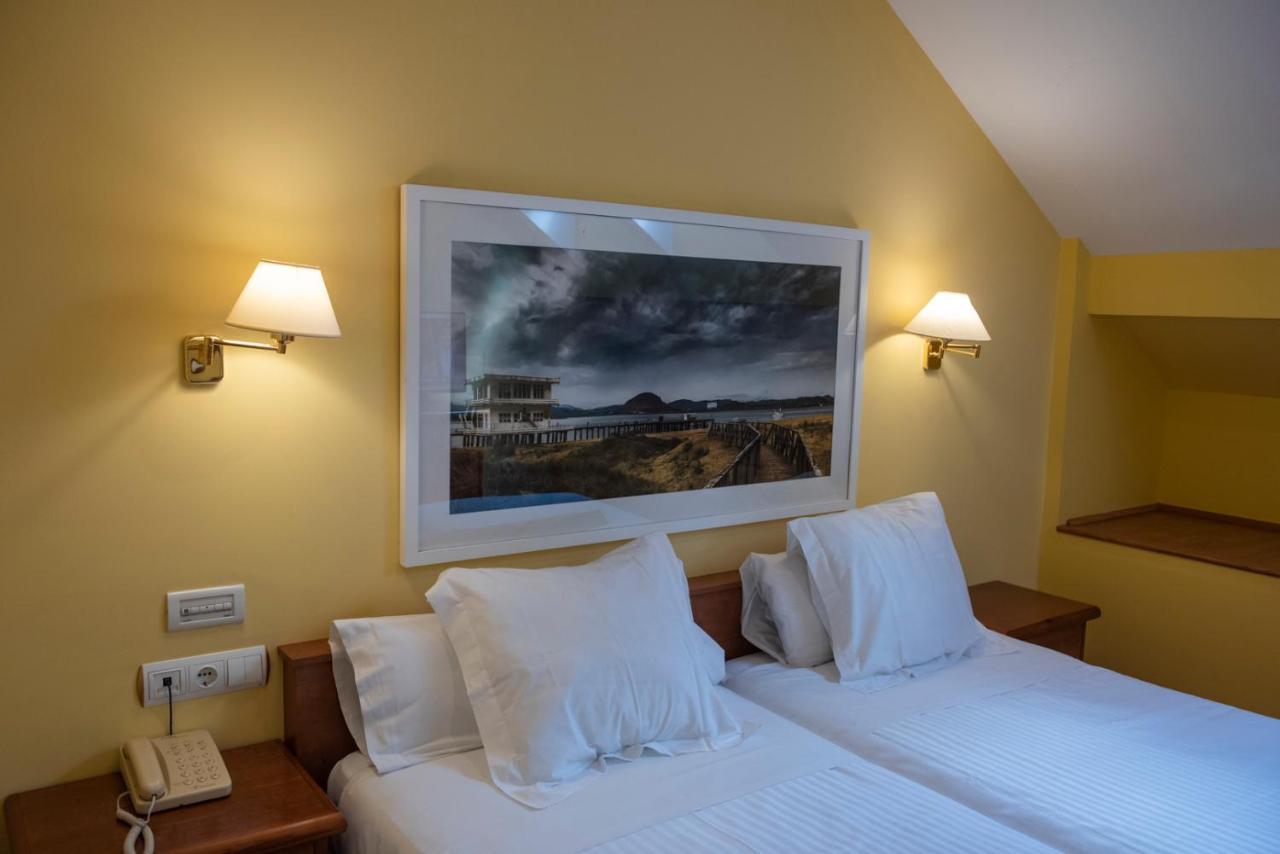 Hotel Faro De San Vicente ซาน บีเซนเต เด ลา บาร์เกรา ภายนอก รูปภาพ