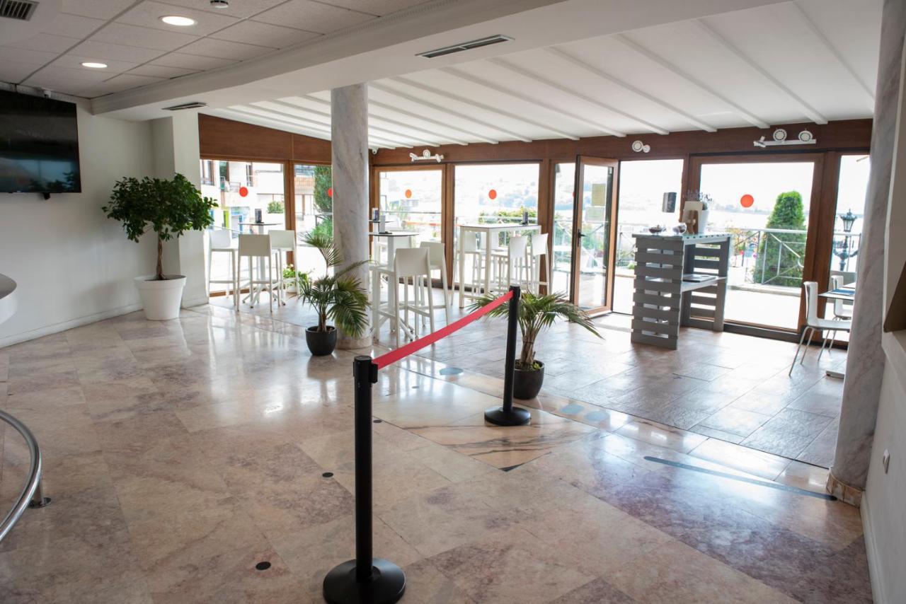 Hotel Faro De San Vicente ซาน บีเซนเต เด ลา บาร์เกรา ภายนอก รูปภาพ