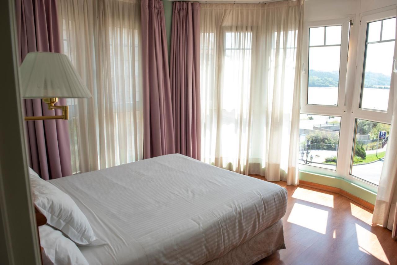 Hotel Faro De San Vicente ซาน บีเซนเต เด ลา บาร์เกรา ภายนอก รูปภาพ