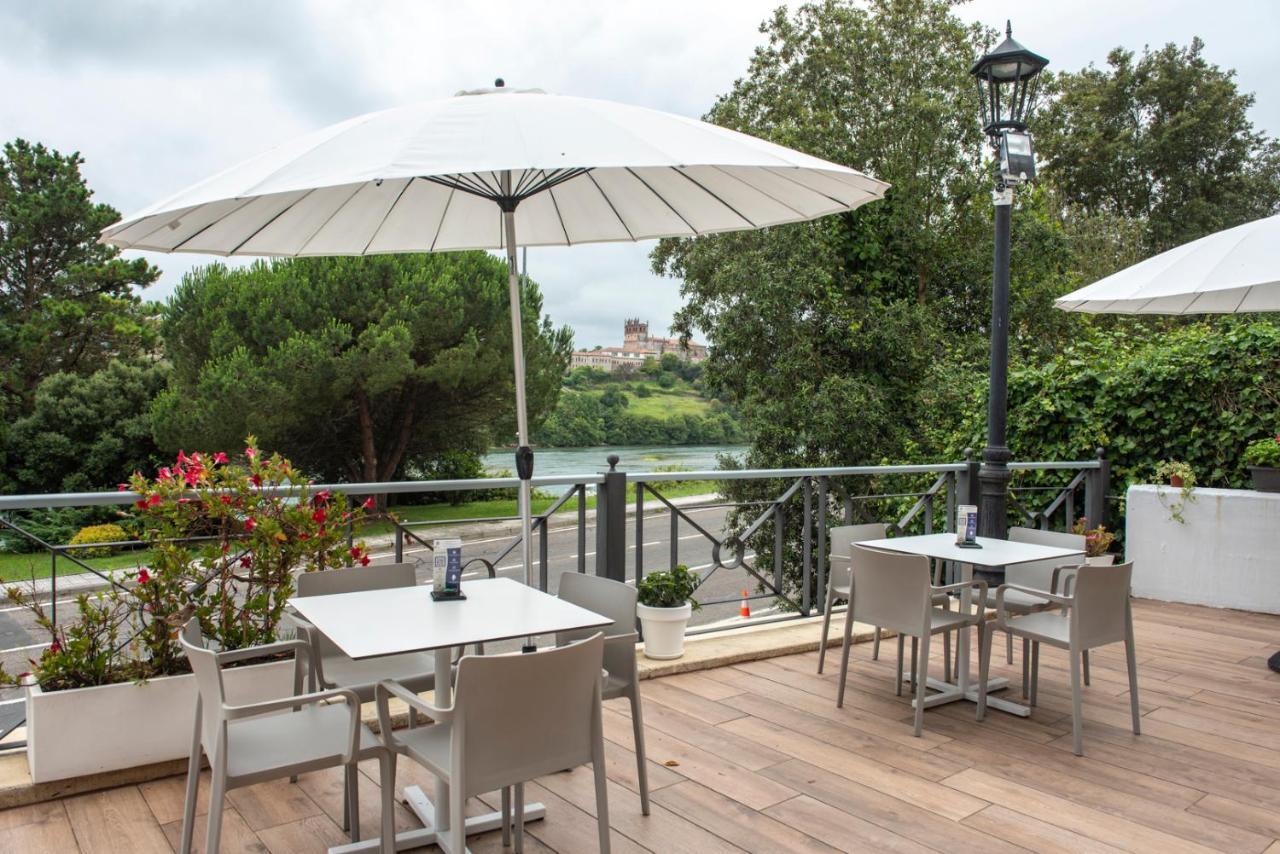 Hotel Faro De San Vicente ซาน บีเซนเต เด ลา บาร์เกรา ภายนอก รูปภาพ