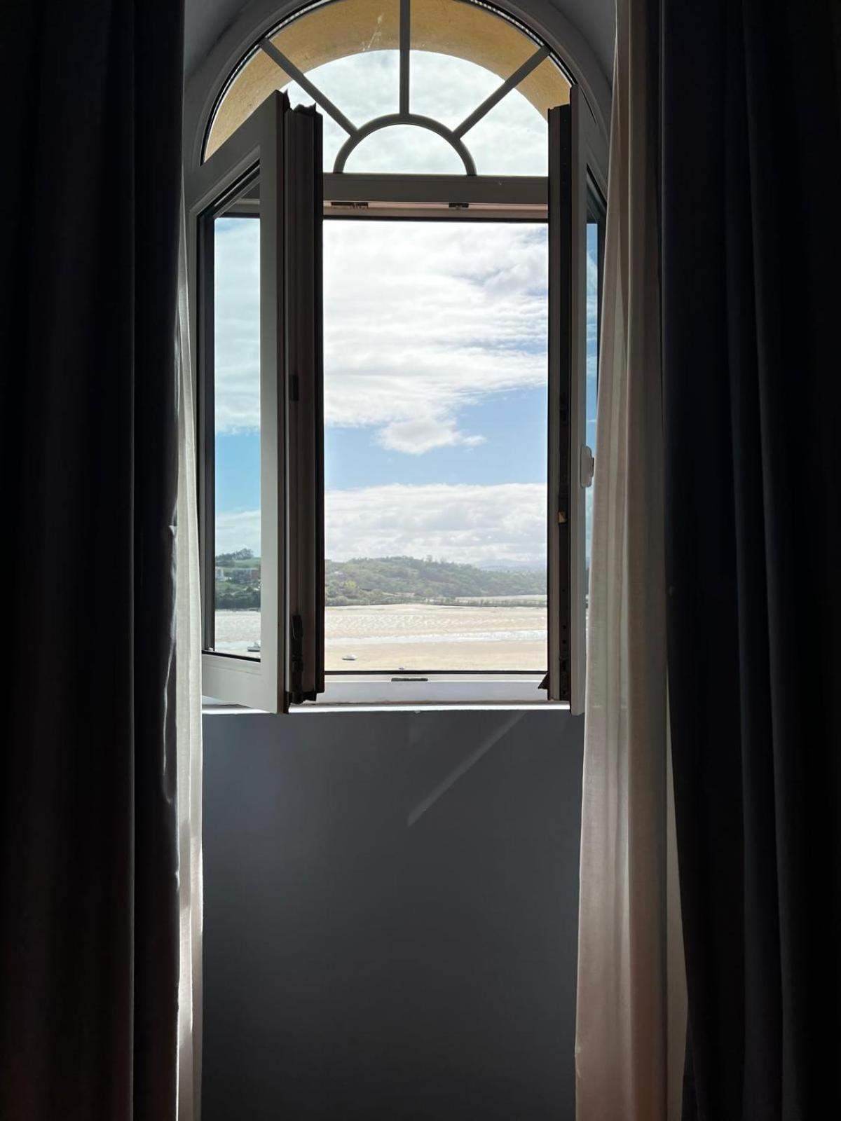 Hotel Faro De San Vicente ซาน บีเซนเต เด ลา บาร์เกรา ภายนอก รูปภาพ