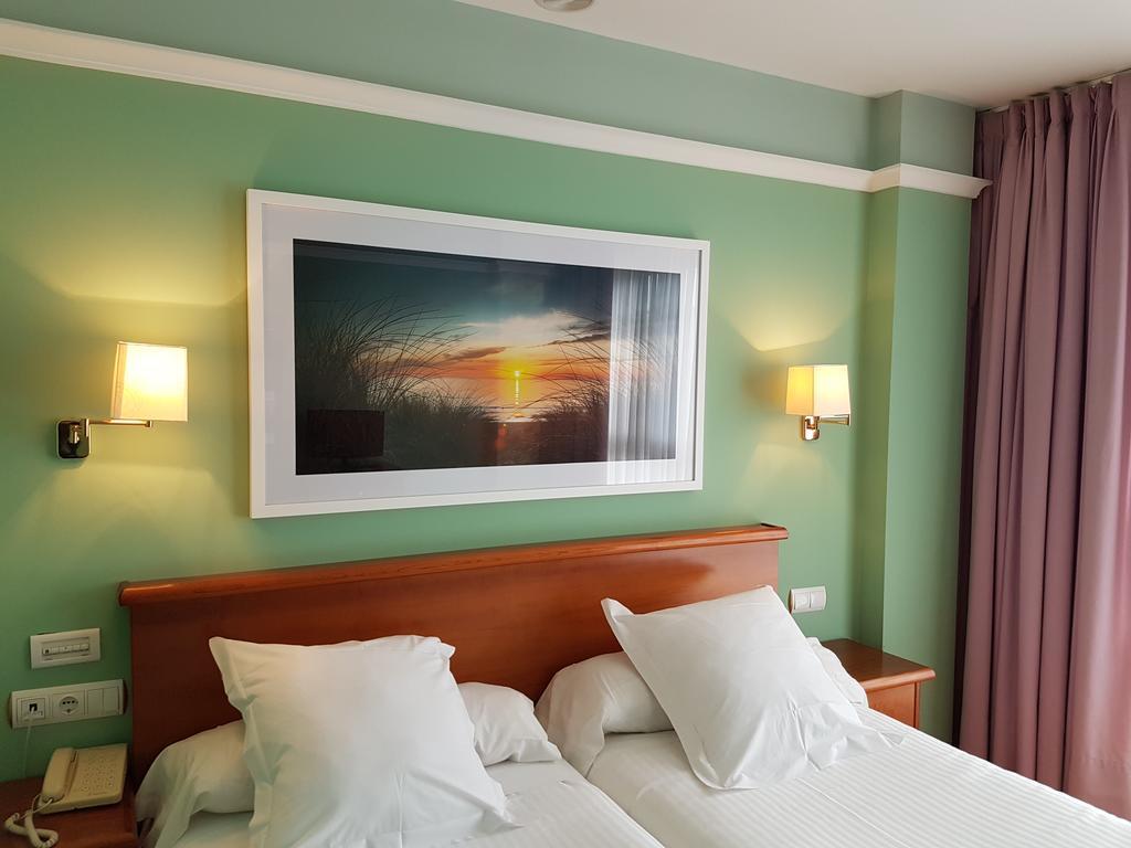 Hotel Faro De San Vicente ซาน บีเซนเต เด ลา บาร์เกรา ภายนอก รูปภาพ